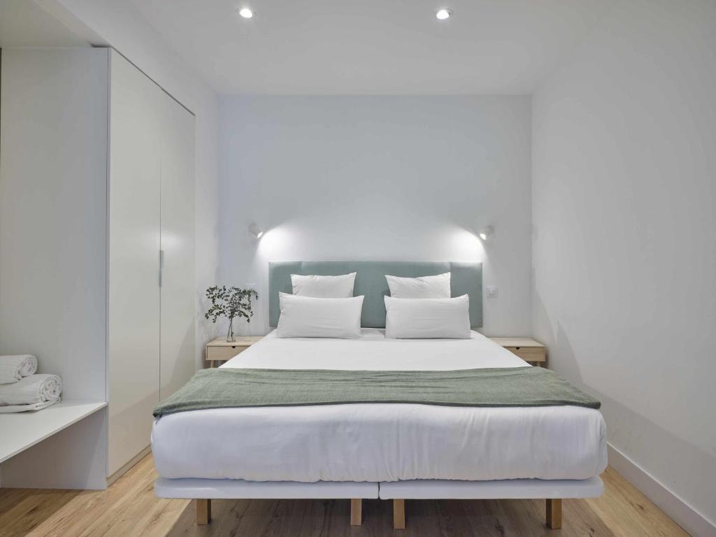 Slaapkamer Paseo Suites Madrid