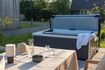 Terras met jaccuzi op vakantiepark in Friesland